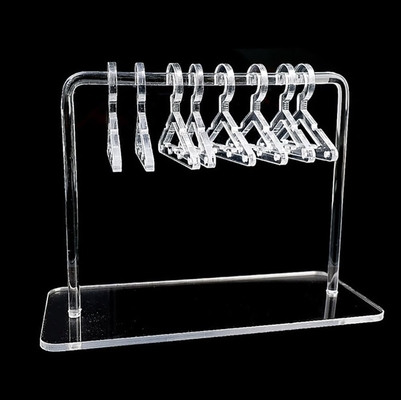 Color claro Acrílico Hanger Rack Display Stand Acrílico Hanger Rack OEM con pendiente de orejas