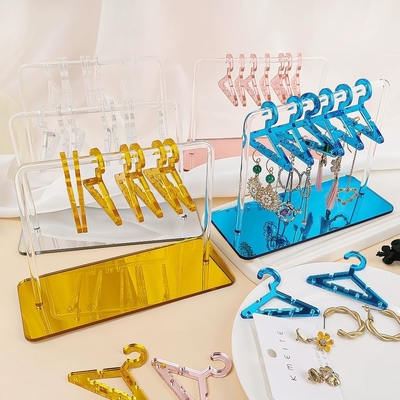 Color claro Acrílico Hanger Rack Display Stand Acrílico Hanger Rack OEM con pendiente de orejas